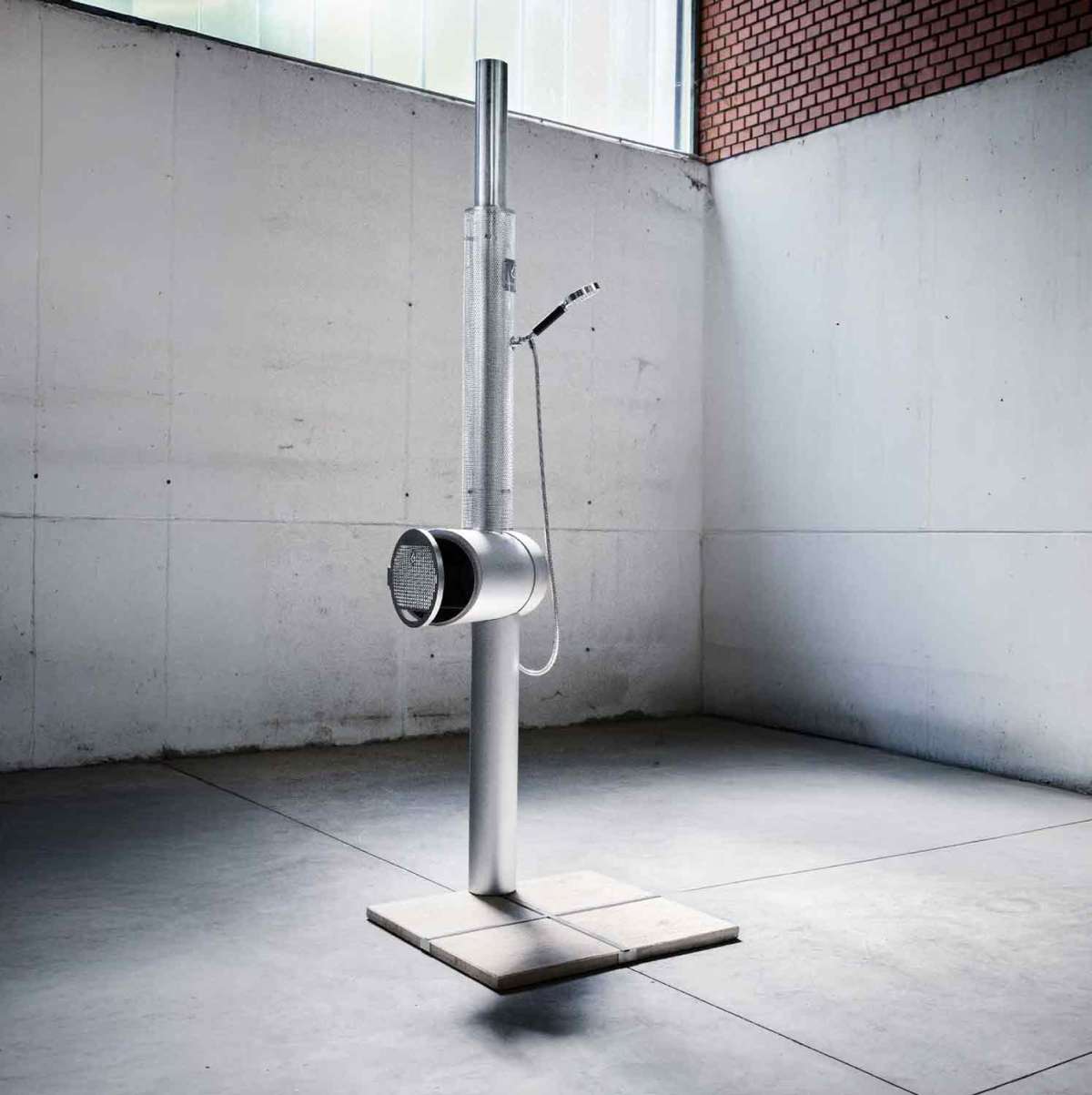 Full view of the Feuerwasser minimalist stainless steel shower column